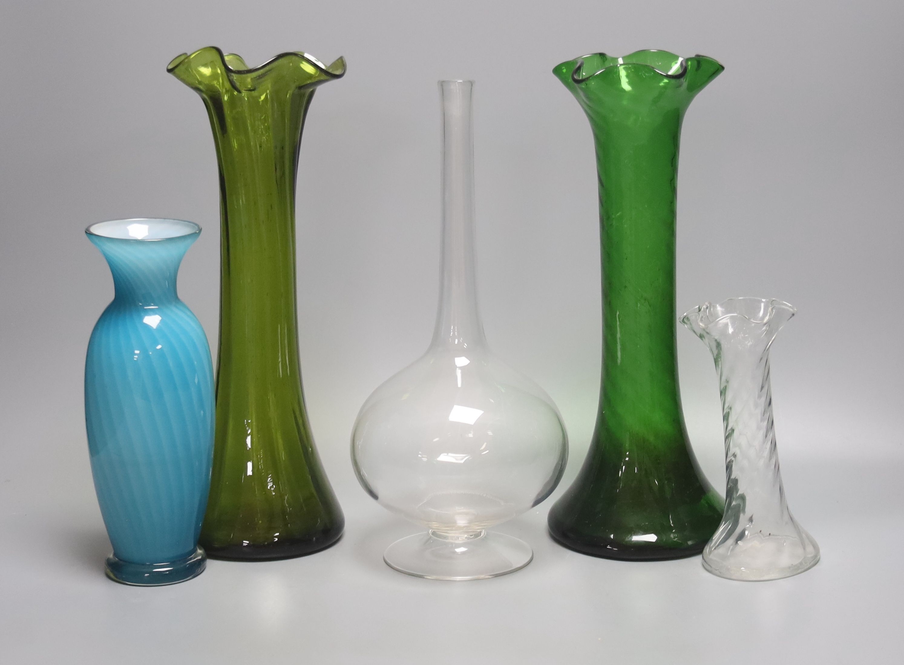Two green glass hyacinth vases, a carafe and two other vases 30.5cm